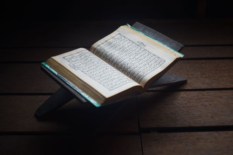 high-angle-view-of-koran-with-rehal-on-hardwood-floor-760320451-5af3903dff1b7800205c9147